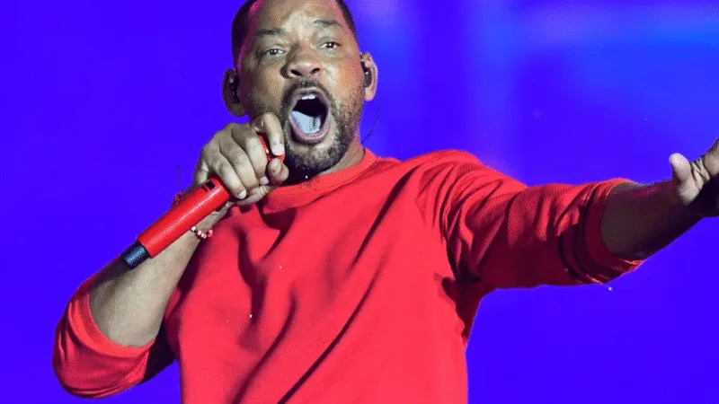 Will Smith accusé de harcèlement sexuel - Scène hip-hop en 2025 avec micro rouge