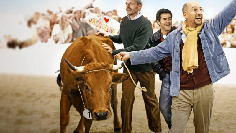 Affiche du film La vache avec Fatsah Bouyahmed, Lambert Wilson et Jamel Debbouze