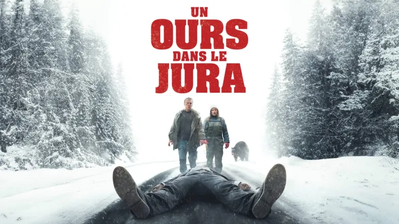 Affiche du film Un ours dans le Jura avec Franck Dubosc et Laure Calamy dans la neige